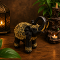 ELEFANTE DECORATIVO NEGRO Y DORADO  (10CM DE LARGO)